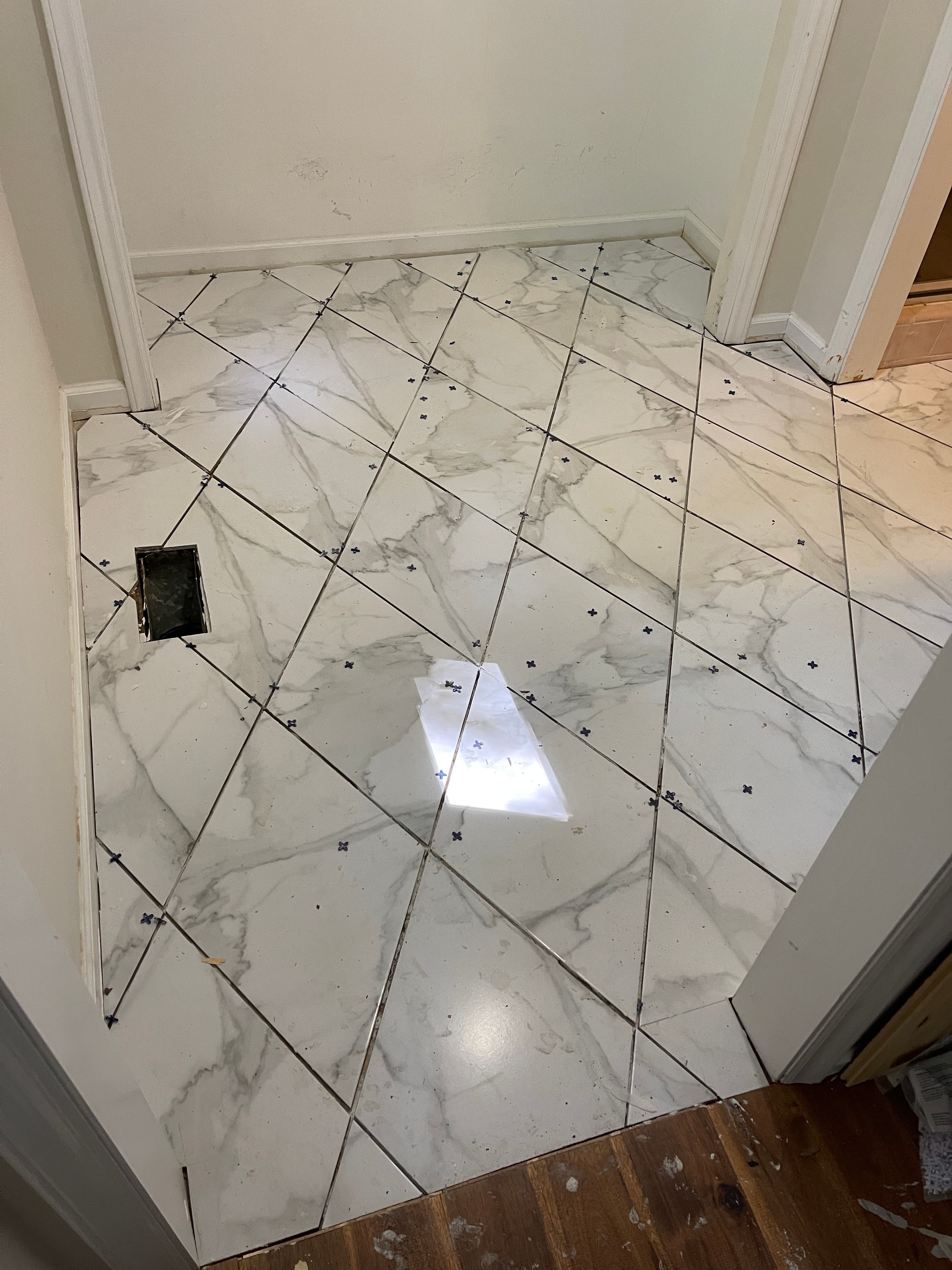Diagonal Marble Floor Installation